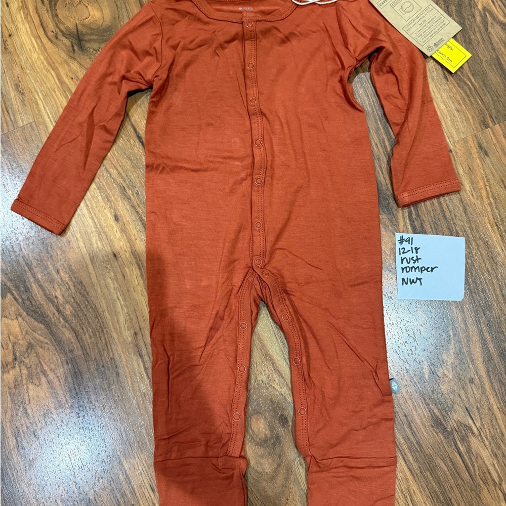 Kyte BABY rust Long Sleeve romper